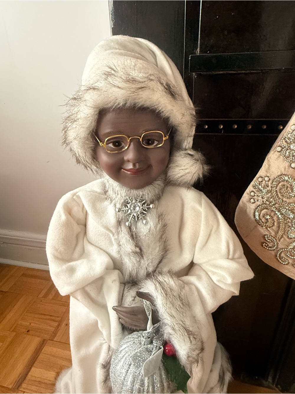 Festive Holiday Mrs. Clause wearing a White Fur-Trimmed Coat. 34in